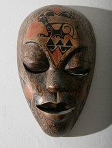 African mask photo by Cezary Piwowarski.